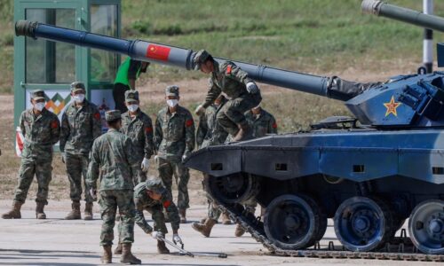 China troops to take part in Russia war games .