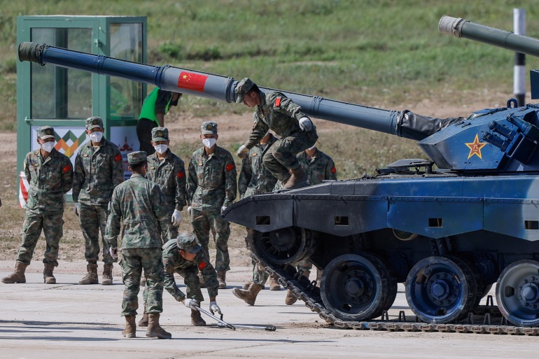 China troops to take part in Russia war games .